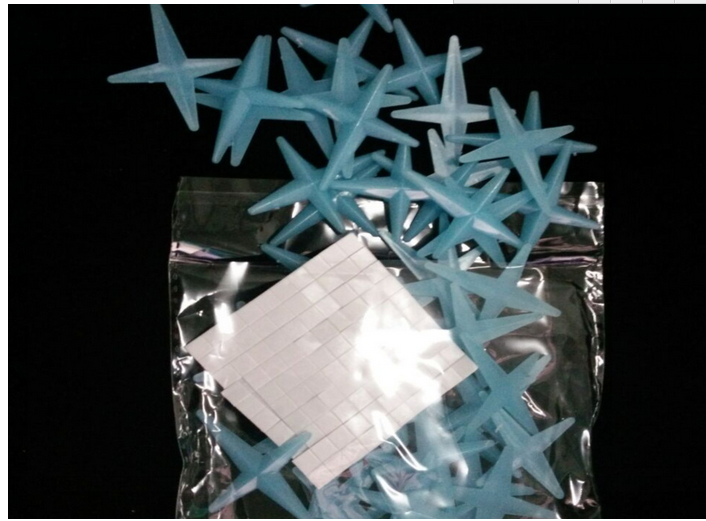 Sao dạ quang 4 cánh bộ 50 cái xanh lá